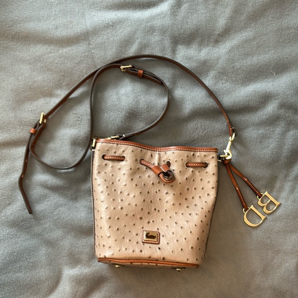 Dooney & Bourke bucket purse. Color~tan & camel ostrich leather. Pics for size. - Picture 2 of 16